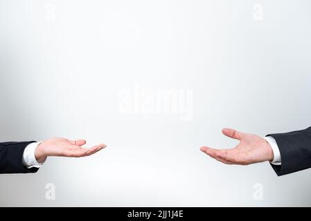 Important Message Presented Between Business Team Hands. Crutial Information Displayed Among Two Palms. Critical Announcements Shown From Man And Stock Photo