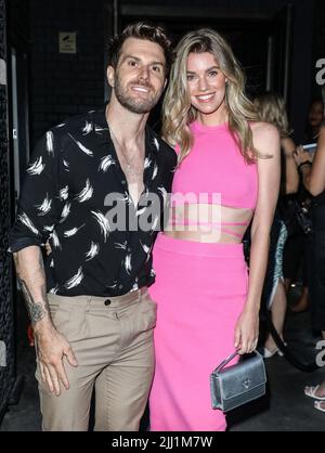 (L-R) Joel Dommett and Hannah Cooper seen attending the ITV Summer Party 2022 at The Mandrake in London. Stock Photo