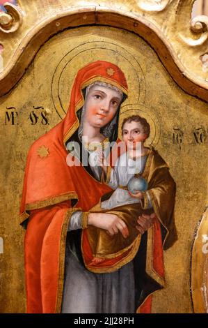 Icon of the Mother of God with Infant Jesus painted around 1780-1790. Part of an iconostasis on display in the Zemplín Museum in Michalovce. Stock Photo