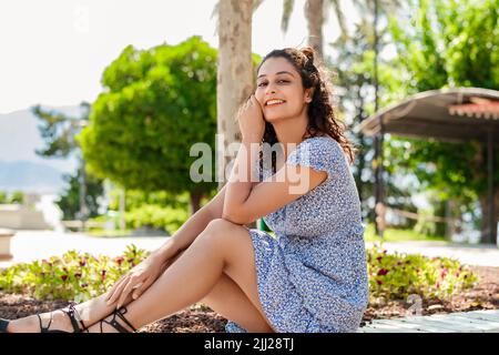 Premium Photo  Cheerful young woman wearing summer clothes