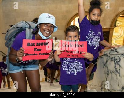 July 20, 2022. Boston, MA. Activists and concerned citizens from 350 Mass marched through the Massachusetts State House to exert pressure get a veto-p Stock Photo