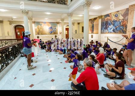 July 20, 2022. Boston, MA. Activists and concerned citizens from 350 Mass marched through the Massachusetts State House to exert pressure get a veto-p Stock Photo