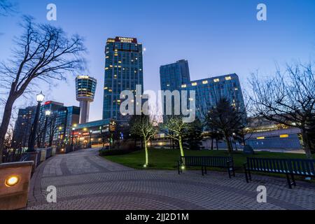 Niagara Falls, Ontario, Canada - December 19 2021 : Fallsview Square Trail, Embassy Suites by Hilton Niagara Falls Fallsview in twilight time. Stock Photo