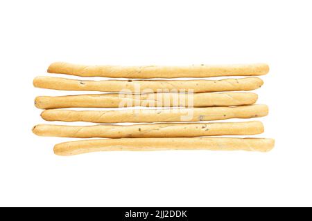 Fresh Italian Grissini Breadsticks isolated on white background. Dry baked bread with olive pieces. Top view, copy space Stock Photo