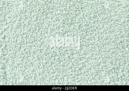 Mint green bath sheet or towels texture background. Bathroom body hygiene or spa concept. Close up, copy space Stock Photo