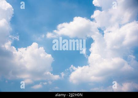White clouds on blue sky in bright day Stock Photo