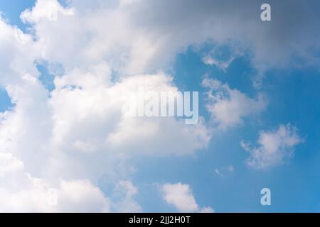 White clouds on blue sky in bright day Stock Photo