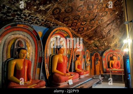 Buddha statues in Alu Vihara where the Tripitaka was enshrined srilanka Stock Photo