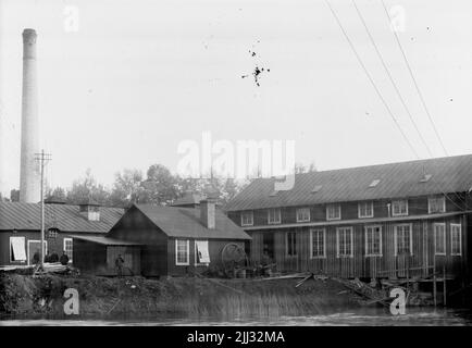 Industrial buildings, workers. Stock Photo