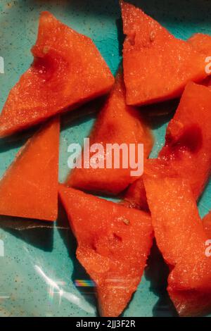 Triangular slices of watermelon. Summer snack Stock Photo - Alamy