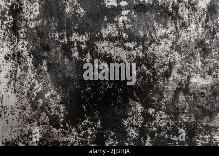 Black and white old grunge scratched metal surface steel background damaged outdated texture obsolete shabby. Stock Photo