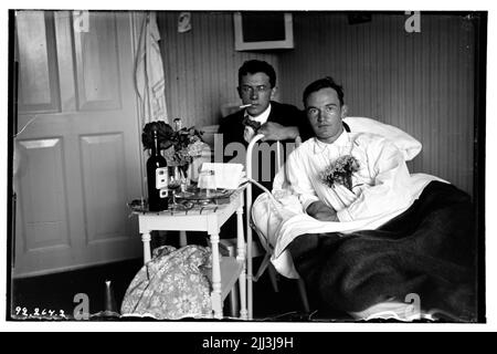 Hålahult's sanatorium, interior, two men by bed, some kind of courting? Stock Photo