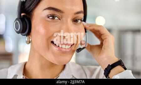 You need thick skin in this industry. a young businesswoman working in a call center. Stock Photo