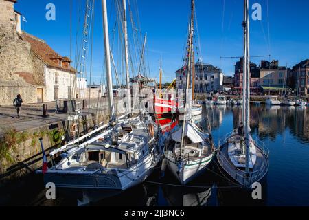 Honfleur, France-October 13,2021: The yachts in port.Honfleur itself has a small new harbour on the small Riviere La Morelle leading to the Bassin Car Stock Photo