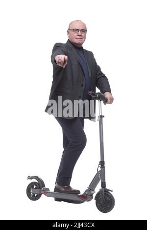 side view . Mature man with electric scooter looking forward Stock Photo