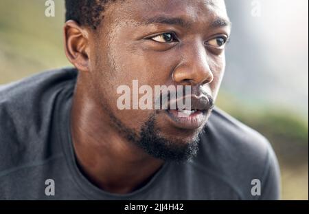 I was serious when I said Ill be focusing on myself. a man resting during his workout. Stock Photo