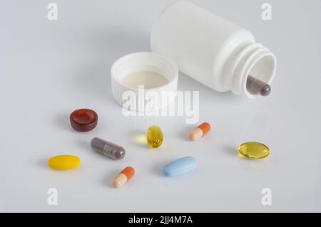 pills, vitamins, pills, jelly beans, white bottle for drugs, on a white background, isolated Stock Photo