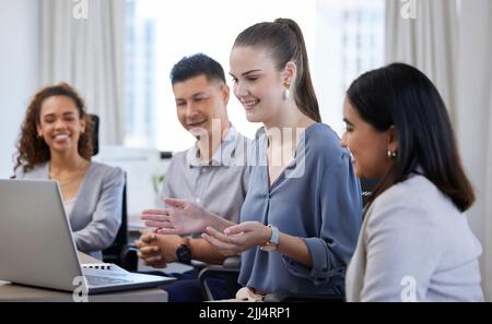 This is what I have prepared for today. a group of businesspeople having a meeting in an office at work. Stock Photo