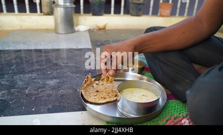 Concept of leisure time and happiness. Marwadi Dishes. Indian Traditional Thali Food. Stock Photo