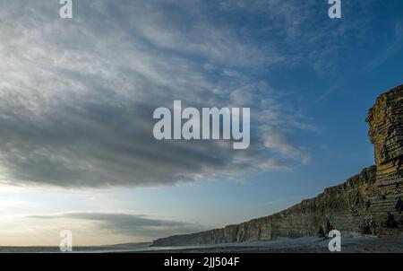 Nash Point Cliffs and High Clouds Glamorgan Heritage Coast, Vale of Glamorgan, South Wales Stock Photo