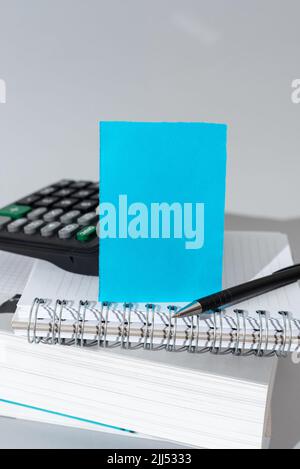Important Message Presented On Piece Of Paper On Desk With Calculator, Books, Pen And Notebook. Crutial Information Written On Note. New Ideas Stock Photo