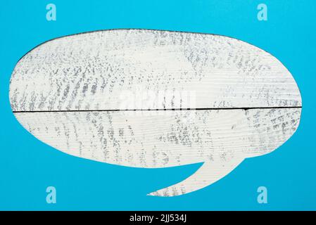 Cropped Speech Bubble With Important Message Placed On Floor. Cut Dialogue Balloon With Crutial Information Inside. Recent Updates Presented In Stock Photo