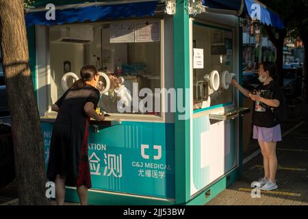 A Nucleic Acid Sampling Station in Beijing, China. China builds thousands of Testing Booths to live with Covid-19. Jul-23-2022 Stock Photo