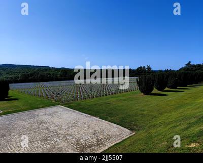 Graves of unidentified French and German soldiers in the cemetery of the Douaumont Ossuary located in Fleury-Devant Douaumont-Vaux France Stock Photo