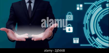 Man Showing Computer Smart Technology System In Hands. Adult Showing Digital Display Technology. Man Displaying Lock And Saving Data With Computer Stock Photo