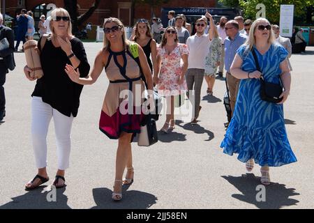 Ascot, Berkshire, UK. 23rd July, 2022. Racegoers arriving at Ascot Racecourse for the QIPCO King George Diamond Day horse racing. Credit: Maureen McLean/Alamy Live News Stock Photo