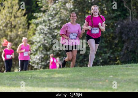 Abington Park, Northampton, UK. 23rd July 2022. Race for Life Pretty Muddy, raising funds for Cancer Research, a  obstacle route which meanders through the very scenic Abington Park. Credit: Keith J Smith./Alamy Live News. Stock Photo