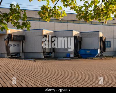 Container Unloading Bay Building Loading Bay Dock Doors Industrial Stock Photo - Alamy