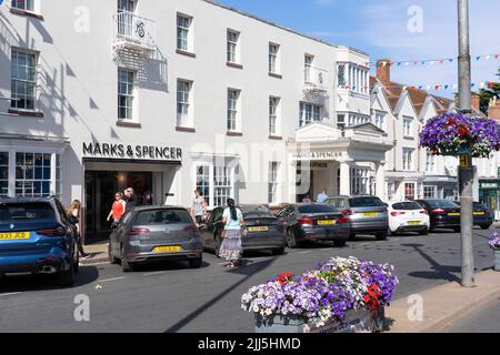 Shoppers entering and leaving Marks and Spencer on Bridge Street in summer, July, in Stratford upon Avon, England. Concept - department store, chain Stock Photo