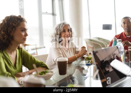 Business colleagues discussing work at office Stock Photo