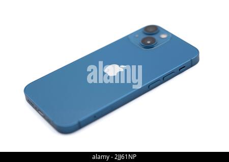 Blue Apple iPhone 13 Mini cut out isolated on white background Stock Photo