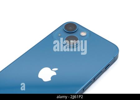 Blue Apple iPhone 13 Mini cut out isolated on white background Stock Photo