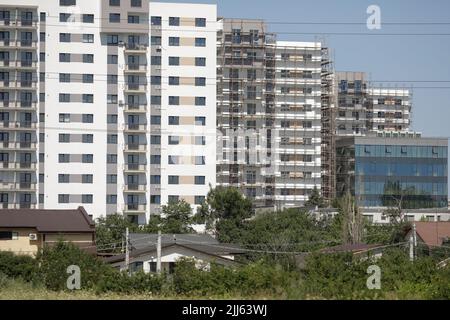 Bucharest, Romania - July 22, 2022: Newly built and still in construction blocks of flats in the Pallady area of Bucharest. Stock Photo