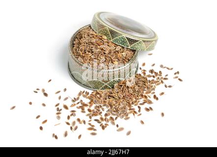 Stack of Dill seeds isolated on white background. Stock Photo