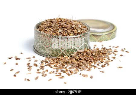 Stack of Dill seeds isolated on white background. Stock Photo