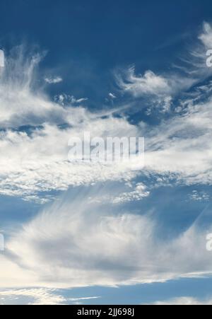 Blue sky with clouds, natural background. Stock Photo