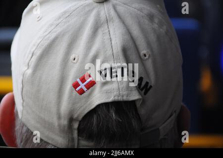 Copenhagen /Denmark/23 July 2022/  Man wears danish vetern cap uring jurney in Copenhagen Denmark,  (Photo..Francis  Dean/Dean Pictures. Stock Photo