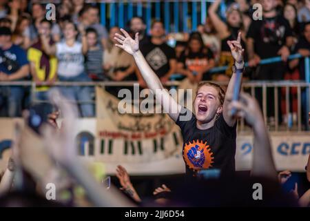 Fans and the crowd enjoy 'No te va a gustar' perform. Stock Photo