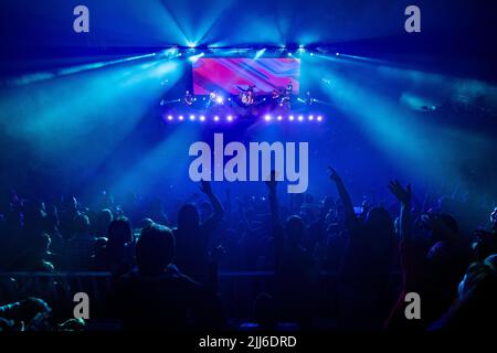 Fans and the crowd enjoy 'No te va a gustar' perform. Stock Photo