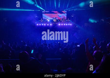 Fans and the crowd enjoy 'No te va a gustar' perform. Stock Photo