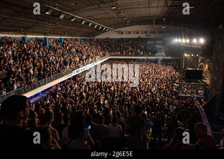 Fans and the crowd enjoy 'No te va a gustar' perform. Stock Photo