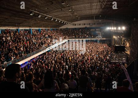 Fans and the crowd enjoy 'No te va a gustar' perform. Stock Photo