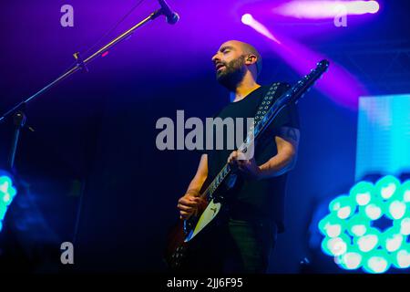 Pablo Coniberti perform between the stage lights during No Te Va a Gustar show in Corrientes, Argentina. Stock Photo