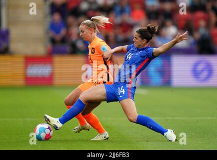 Netherlands' Jackie Groenen (left) and France's Charlotte Bilbault battle for the ball during the UEFA Women's Euro 2022 quarter-final match at New York Stadium, Rotherham. Picture date: Saturday July 23, 2022. Stock Photo