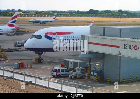 HEATHROW, ENGLAND -14 JUL 2022- View of an airplane from British Airways (BA) at London Heathrow Airport (LHR), the main airport in London. Stock Photo