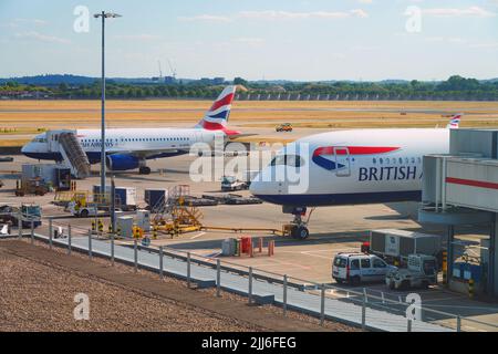 HEATHROW, ENGLAND -14 JUL 2022- View of an airplane from British Airways (BA) at London Heathrow Airport (LHR), the main airport in London. Stock Photo